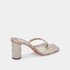 RHYE HEELS IN LT TAUPE EMBOSSED STELLA - Dolce Vita